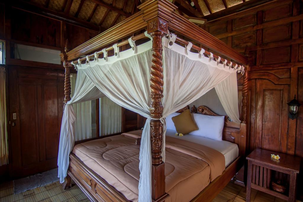Ganesha Ubud Inn Стая снимка