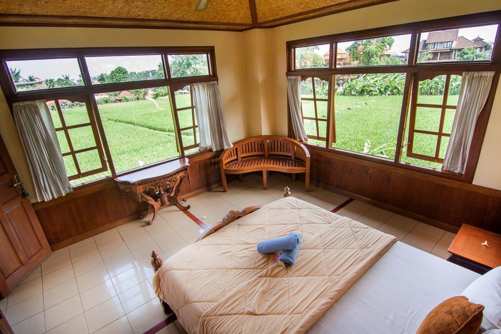 Ganesha Ubud Inn Стая снимка